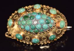 Victorian 15ct gold brooch set with turquoise cabochons in a domed setting, with rope twist