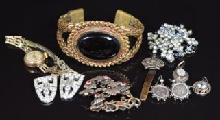A collection of jewellery including Victorian silver earrings, Art Deco paste clips, two silver