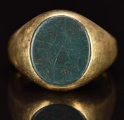 A 9ct gold signet ring set with bloodstone, 8.5g, size Q