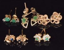 Five pairs of 9ct gold studs including sapphire and emeralds, 3.8g