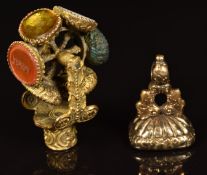 Victorian pinchbeck revolving intaglio seal set with six carved agates including French and English,