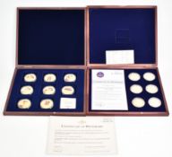 Windsor Mint two sets of gold plated commemorative coins for Royal Celebrations, in deluxe fitted