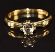 An 18ct gold ring set with zultanite and diamonds, 3.8g, size M/N