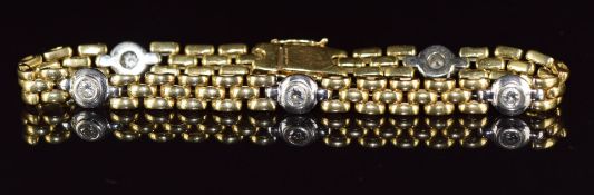 An 18ct gold bi-coloured bracelet set with five diamonds, each approximately 0.15ct, length 20cm,