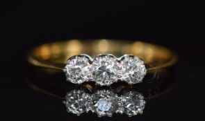 An 18ct gold ring set with three diamonds each approximately 0.14ct, 1.8g, size O