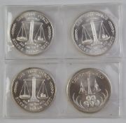 Four silver Universaro Trade Unit coins, each 1 troy oz, 31.1g