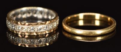 An 18ct gold ring (2.5g, size P) and a 9ct gold eternity ring set with spinel (2.9g, size N)