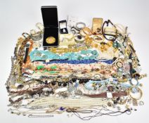 A collection of jewellery including vintage brooches, Sphinx brooch, earrings, necklaces, etc