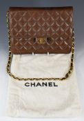 Vintage Chanel chocolate brown quilted leather handbag with classic chain strap and logo, c1980's,