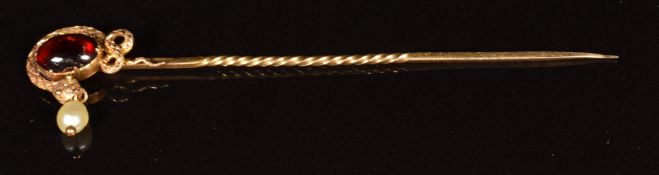 Victorian stick pin in the form of a serpent set with a foiled garnet and drop pearl