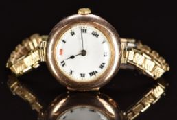 Rolex 9ct gold ladies wristwatch with blued hands, Roman numerals, white enamel dial and signed 15