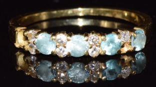 An 18ct gold ring set with topaz and diamonds (two stones missing), 2.5g, size N