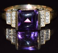 A 9ct gold ring set with a rectangular amethyst cabochon and diamonds, 3.2g, size N