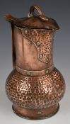 Arts & Crafts copper jug, with riveted and hammered decoration, height 27cm