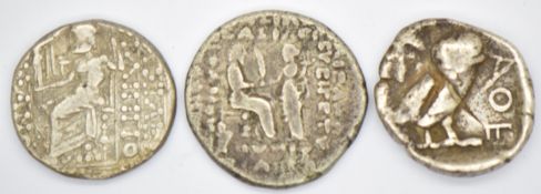 Three Ancient Greek silver coins to include Parthia Phraates 25 BC and Philip Philadelphus 93-83 BC,