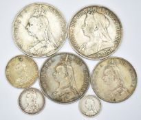 Seven Queen Victoria silver coins comprising two crowns and a double florin, a half crown, a