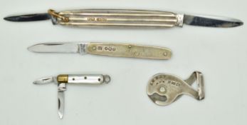 Two hallmarked silver folding knives, one with gold stripe decoration together with a further mother