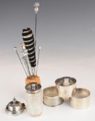 Three hallmarked silver napkin rings including a pair, hallmarked silver lidded condiment, similar