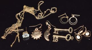 Two 9ct gold crosses and chains, three pairs of 9ct gold earrings and two 9ct gold key charms, 5.7g