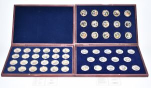Windsor Mint two gold plated picture coin collections comprising Big Game and Dinosaurs, both in
