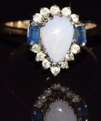 A 9ct gold ring set with an opal, sapphires and paste, 3.1g, size O
