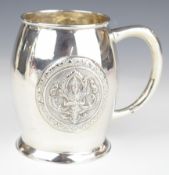 Thai silver pint or similar tankard with embossed decoration of a deity to front and back, marked to