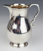 Walker & Hall Elizabeth II hallmarked silver jug, Birmingham, date letter rubbed, height 12cm,