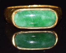 Chinese 999 gold ring set with an oval jade cabochon, 6.4g, size N