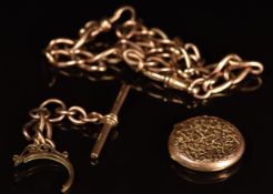 A 9ct rose gold watch chain and T bar, length 36cm, 38g, 9ct gold front and back locket