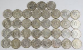 Thirty-five Republic Francaise Nouvelles Hebrides 0.835 silver 100 franc coins, each 25.2g