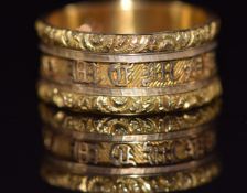 Georgian 18ct gold mourning ring with embossed borders and letters reading 'In memory of' , engraved