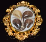 Victorian yellow metal swivel brooch set with a photograph, verso hair and seed pearls, 44.6g