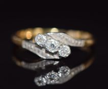 Art Deco 18ct gold ring set with three diamonds in a platinum twist setting, 2.8g, size P