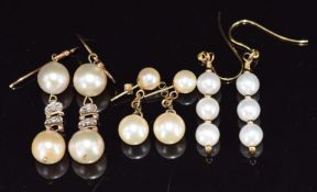 Two pairs of 9ct gold earrings set with pearls and another pair of pearl earrings, 10.6g