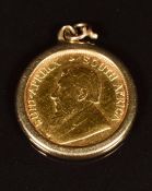 A 9ct gold pendant set with a 1985 1/10 gold Krugerrand, 4.1g