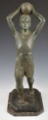 Spelter figure of a footballer taking a throw in, indistinctly marked to base, height 63cm