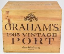 Twelve bottles of Graham's 1985 vintage port, in original wooden case