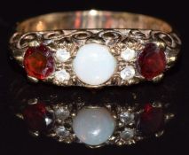 A 9ct gold ring set with an opal, garnets and spinel, 3g, size N