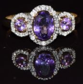 A 9k gold ring set with amethysts and diamonds, 1.9g, size Q