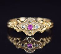 An 18ct gold ring set with a ruby and diamonds, 2.4g, size M