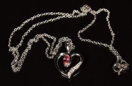 An 18k white gold necklace set with Ceylon padparadscha sapphire and diamonds, 3.1g