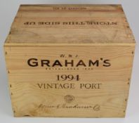 Twelve bottles of Graham's 1994 vintage port, in original wooden case