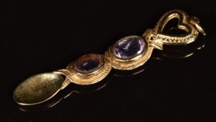 A 9ct gold Welsh love spoon pendant set with two oval cut amethysts, 4.4g