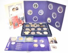 A collection of modern commemorative coins in a Westminster case, together with some presentation