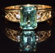 An 18ct gold ring set with paraiba tourmaline and diamonds, 4g, size M