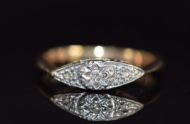 A 9ct gold ring set with a diamond in a platinum setting, 1.7g, size J