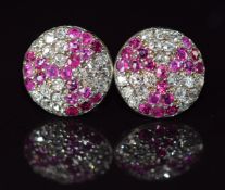 A pair of Art Deco platinum earrings each set with old cut rubies and diamonds, 3g, 1cm diameter