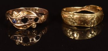 An 18ct gold ring (2.3g) and a 9ct gold ring (1.2g)