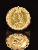 A 9ct gold ring set with an 1892 gold half sovereign, 9.1g, size Q