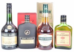 Four bottles of brandy / cognac comprising two bottles of Three Barrels VSOP 70cl, 38% vol, Remy